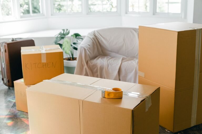 Moving boxes packed in a bright apartment before move-out